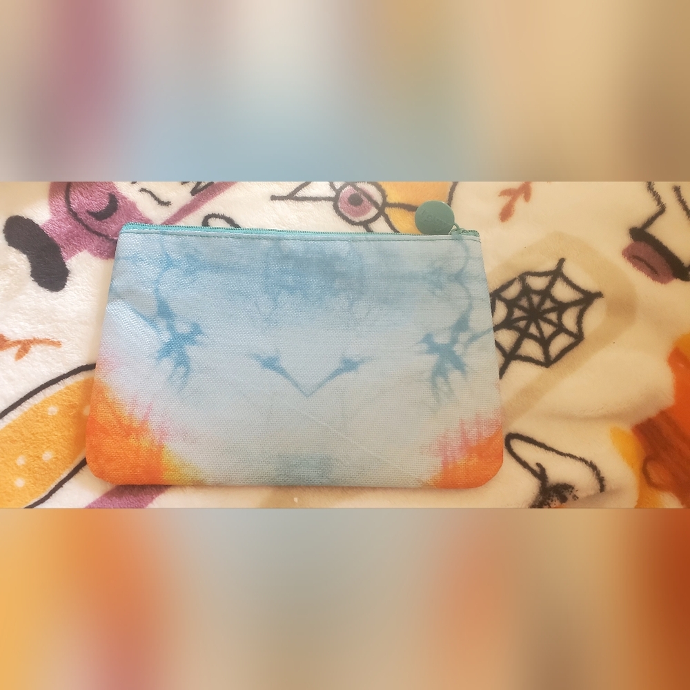 Ipsy Zipper pouch.